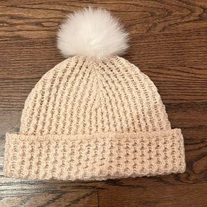 Cable knit hat fox fur trim.